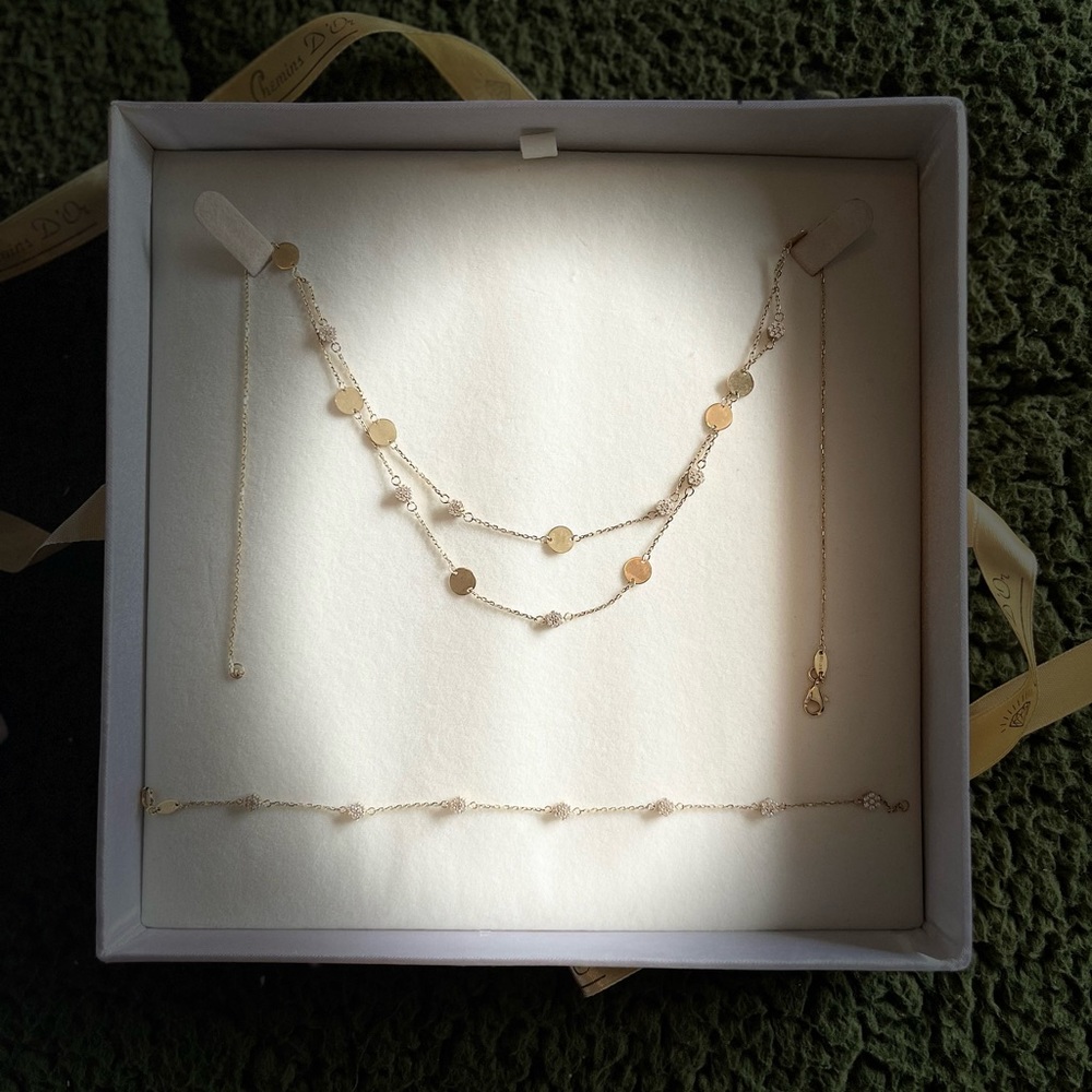 Chemin D’or gold double chain with matching bracelet